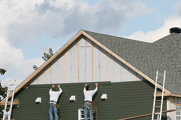 Professional Siding Repair technician working in Hurlock, MD